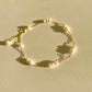 delicate pearl bracelet, with every three small pearls strung together， gold vermeil