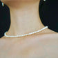 Display of a classic pearl strand necklace